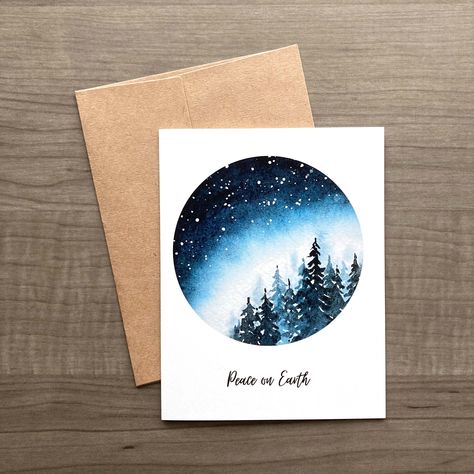 Send holiday joy to your loved ones with these cards featuring a peaceful winter forest scene, painted in a loose watercolor style. ITEM DETAILS: 6 or 18 cards - approximately 4.25 x 5.50 inches (folded) 6 or 18 envelopes - approximately 4.30 x 5.75 inches (choice of brown kraft or white) My own original watercolor artwork has been scanned and professionally printed. These cards are blank on the inside with my shop name and URL printed in small font on the back. ADDITIONAL NOTES: Envelope style Watercolor Christmas Cards Ideas Winter Scenes, Loose Watercolor Christmas Cards, Watercolor And Ink Christmas Cards, Handmade Christmas Cards Ideas Creative, Christmas Card Painting Ideas, Christmas Cards Handmade Watercolor, Artistic Christmas Cards, Christmas Watercolors, Christmas Cards Watercolor