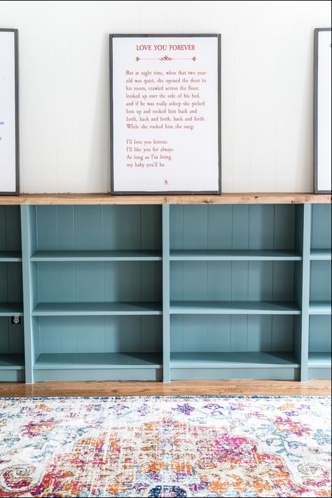 An easy to follow step-by-step tutorial showing how to build bookcase built-ins using IKEA Billy bookcases. #IKEAhack #homeimprovement #build #playroom Billy Bookcase Wood Top, Built In Shelves Small Spaces, Diy Custom Bookshelves Built Ins, Making Bookshelves Look Like Built Ins, Long Bookshelf Low Bookcase Diy, Ikea Billy Short Bookcase, Diy Large Bookcase, Build Your Own Built In Bookcase, Ikea Short Billy Bookcase Hack