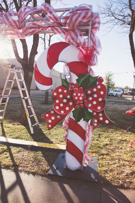 Candy Cane Photo Booth, Christmas Gates Entrance, Candy Cane Lane Decorations Outdoor, Candy Cane Theme Decorations Outdoor, Candy Cane Lane Decorations, Christmas Entrance Decor, Candy Cane Lane Door Decorations, Candy Cane Entrance, Candy Cane Forest Decorations