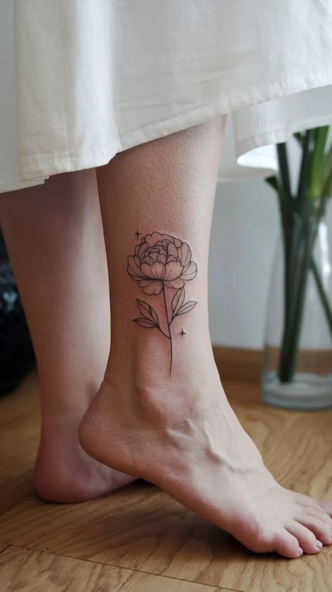 11 Peony Tattoo Ideas for a Beautiful Design 12 3 Peonies Tattoo, Peony Arm Sleeve Tattoo, Abstract Peony Tattoo, Peony Spine Tattoo, Simple Peony Tattoo, Fine Line Peony Tattoo, Primrose Tattoo, Pink Peony Tattoo, Amaryllis Tattoo