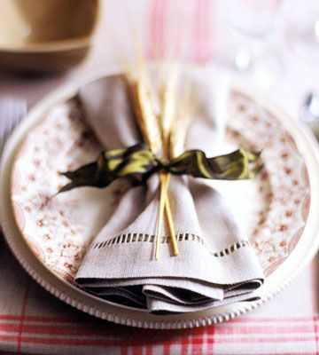 Thanksgiving napkin Napkin Fold With Ribbon, Napkin Ribbon Tie, Tying Napkins With Ribbon, Napkin Folding Ideas With Ribbon, Ribbon Tied Napkins, Thanksgiving Place Settings, Thanksgiving Napkin Folds, How To Fold Napkins, Thanksgiving Checklist