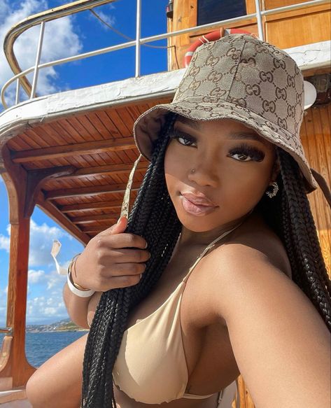 Braids With Bucket Hat, Braids With A Hat Black Women, Bucket Hat Braids, Bucket Hat Outfit With Braids, Chic Braided Hats For Vacation, Bucket Hat With Braids, Braids And Bucket Hat, Bucket Hat Swimsuit Outfit Black Women, Hairstyles For Vacation