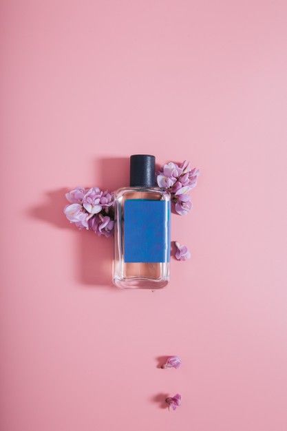 Wall With Flowers, Butterfly Pea Flower Tea, White Marble Background, Perfume Photography, Brown Bottles, Pink Perfume, Lime Oil, Aromatic Oils, Fragrance Bottle