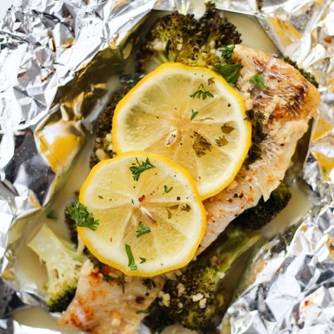 Baked Lemon-Butter Haddock in Foil - Hannah Magee RD Foil Packet Fish, Grilled Haddock, Baked Haddock Recipes, Fish In The Oven, Fish In Foil Packets, Baked White Fish, Foil Packet Recipes, Garlic Parmesan Roasted Potatoes, Grilled Foil Packets