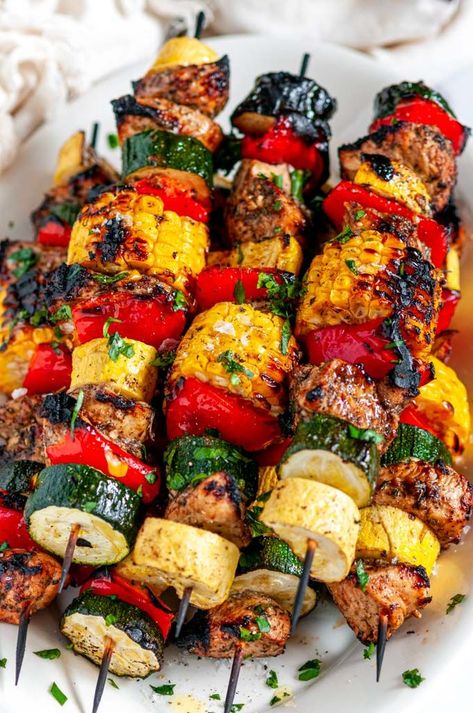 Balsamic Chicken Vegetable Kabobs - Juicy, delicious marinated chicken on a stick grilled with summer squash, zucchini, red bell pepper, and corn on the cob. Dairy and gluten free! From aberdeenskitchen. #balsamic #chicken #vegetable #kabobs #grilling #summer #bbq #dinner #recipe #dinner #dairyfree #glutenfree Sweet Fire Chicken, Easy Campfire Meals, Panini Recipes Chicken, Grilled Kabob Recipes, Veggie Kabobs, Grilled Chicken Kabobs, Vegetable Kabobs, Chicken Skewer Recipe, Ways To Cook Chicken