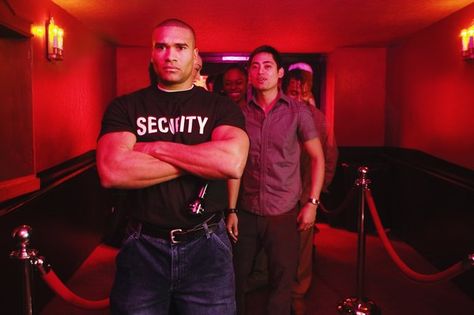 A bouncer is otherwise known as the doorman or door security and is typically employed in nightclubs and bars. Standing post at the entrance, the bouncer's responsibility is to refuse entrance to patrons who do not meet minimum age requirements. Bouncer Aesthetic, Security Guard Services, Door Security, Security Training, The Guard, Training Academy, Background Check, Security Guard, Music Venue