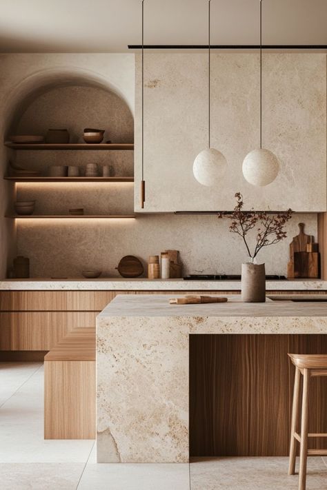 Add neutral tones and natural elements to create a calm, inviting kitchen. #NeutralKitchen #NaturalDecor #CalmingSpaces Earth Toned Kitchen, English Kitchen Design, Modern Neutral Kitchen, Warm Cozy Kitchen, Natural Modern Kitchen, Beige Countertops, Calming Kitchen, Natural Kitchen Design, Timeless Kitchen Ideas