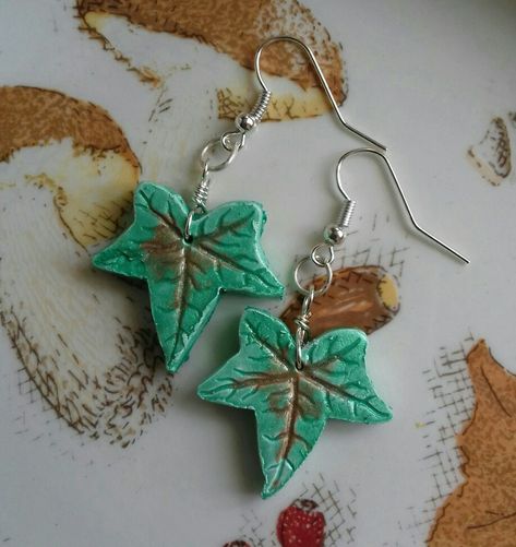 Ivy earrings made from air dry clay. Air Dry Clay Jewelry Diy Necklaces, Air Dry Clay Necklace, Dry Clay Jewelry, Dry Clay Earrings, Air Dry Clay Jewelry, Air Dry Clay Earrings, Ivy Earrings, String Earrings, Clay Inspo