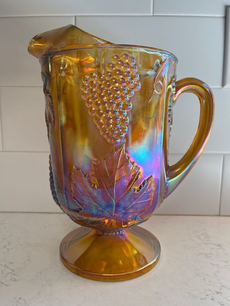 Beautiful example of the classic American carnival glass made by Indiana glass. No chips or cracks. Very good condition, heavy and well-made. Antique Stuff, Vintage Childhood, Carnival Glass Vintage, Vintage Dishware, Ayurvedic Healing, Pitcher Set, Vintage Carnival, Antique Glassware, Glass Pitcher