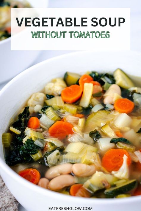 Two white bowls of vegetable soup without tomatoes. Vegetable Leek Soup, Vegetable Soup No Tomatoes, Vegetable Soup Without Tomatoes, Soup Without Tomatoes, Bean Vegetable Soup, Vegan Vegetable Soup, Bean And Vegetable Soup, Easy Vegetable Soup, Meal Rotation