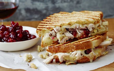 Ree Drummond's Leftover Turkey Panini | Level: Easy. Total: 15 min. Active: 15 min. Yield: 1 sandwich (2 servings). Cook’s Note: If you use a grill pan or skillet, place a second heavy pan or skillet on top of the sandwich to press it. Thanksgiving Panini, Turkey Panini, Christmas Leftovers, Leftover Thanksgiving, Thanksgiving Leftover Recipes, Panini Recipes, Leftover Cranberry Sauce, Best Thanksgiving Recipes, Food Network Canada