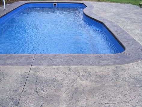 Read this article to find out which type of concrete patio would work best for your swimming pool project-- stamped or brushed concrete. Backyard Patio With Pool, Pool Stamped Concrete, Pool Decking Concrete, Patio With Pool, Inground Pool Landscaping, Concrete Deck, Types Of Concrete, Concrete Patios, Pool Renovation