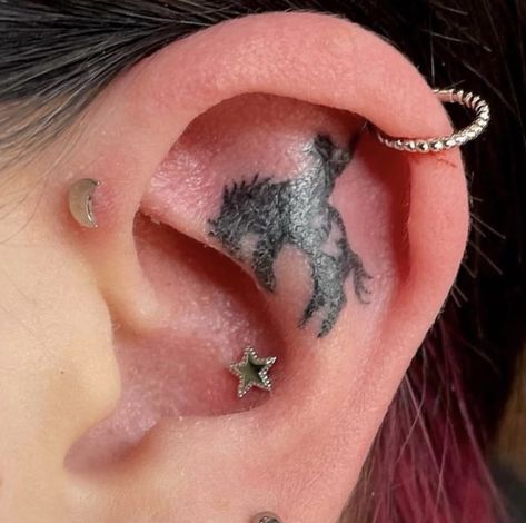 Inner ear tattoo coastal cowgirl rodeo fine line modern small cute dainty piercing Cowgirl Face Tattoo, Western Ear Tattoos, Western Fine Line Tattoo, Coastal Cowgirl Tattoo, Dainty Face Piercings, Dainty Face Tattoos, Rodeo Tattoo, Coastal Tattoos, Ear Tattoo Inner