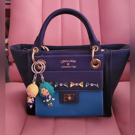 Like New, Minor Scratches On Metal. Authentic Samantha Vega (Japanese High-End Bag Designer) X Sailor Uranus And Neptune Bag. It Is Absolutely Gorgeous And Extremely Rare Item To Collect. This Bag Has 2 Bags In 1, One Is The Little Mini Bag That Clips Off And The Other Is The Tote Bag. Can Wear Them Both Together Or One At A Time. The Price Is Firm! The Bag Clips Are Not Included! Sailor Uranus And Neptune, Uranus And Neptune, Sailor Uranus, Bag Clips, The Tote Bag, Sailor Moon, Blue Gold, Mini Bag, Bags Designer