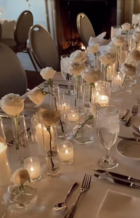 Minimalist White Rose Centerpiece, Candle And Rose Centerpieces Wedding, Single Rose Table Centerpiece, Long Stem Rose Centerpiece Wedding, Champagne Wedding Reception Tables, White Candles Wedding Table, White Rose Table Setting, Wedding Table Decorations White Roses, Candles Wedding Reception Table