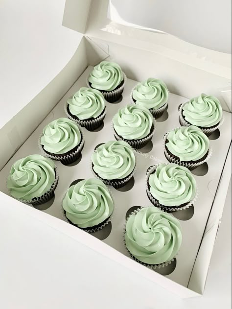 Simple piped buttercream frosted cupcakes Cupcakes With Green Frosting, Green Frosted Cupcakes, Green Frosting Cupcakes, Sage Green Birthday Cupcakes, Light Green Cupcakes, March Cupcakes, Mint Green Cupcakes, Green Cupcakes Ideas, Sage Green Cupcakes