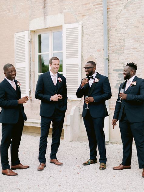 Elijah and his groomsmen, his three closest friends, donned tuxes from The Black Tux and accessorized with pink ties and brown shoes. Black Suit Brown Shoes, Whimsical Wedding Theme, France Chateau, Burgundy Dahlia, Blue Tuxedo, Dinner Reception, Surprise Dance, Groom Fashion, Mens Wedding Attire