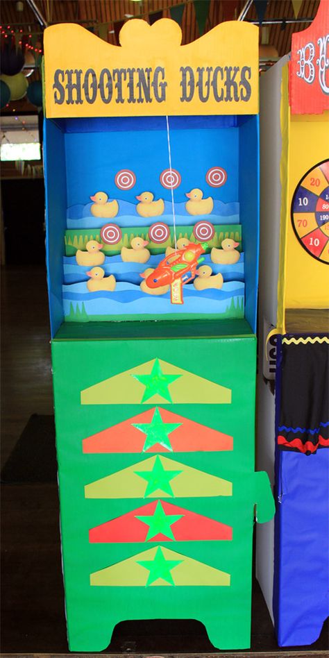 Shooting Ducks stand,  layers of cardboard where created, so the ducks and target could be staggered. A toy gun was hung from the top of the stand. Cardboard Carnival, Carnival Classroom, Circus Clipart, Diy Carnival Games, Carnival Booths, Fall Festival Games, Game Booth, Skylanders Party, Carnival Parties