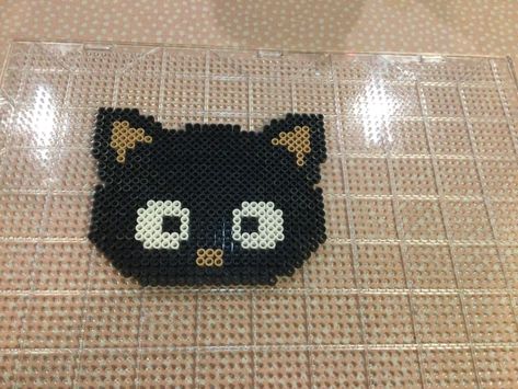 I made this because i love chococat. Chococat is a sanrio character. I hope you like tjis and that i5 will help yo7 with your perler bead mak8ng! Choco Cat Perler Beads, Perler Sanrio, Sanrio Perler Beads, Grid Artwork, Choco Cat, Pixel Grid, Kandi Inspo, Perler Creations, Melty Bead Patterns