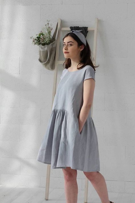 Perfect linen dress for summer features drops shoulder sleeves combined with round neckline. Free, loose silhouette lets You feel comfortable all day long. Nice ruffled details at the front and back create more space and freedom for Your movements. DETAILS: - round neckline closure with wooden Linen Casual Dress, Grey Blue Dress, Blue Linen Dress, Linen Sundress, Marine Uniform, Linen Fashion, Summer Linen Dresses, Linen Casual, Loose Fitting Dresses