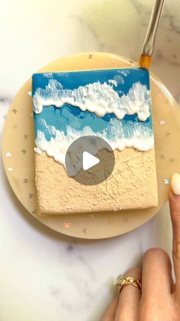 Laura Luk | Atlanta Custom Cookies on Instagram: "Let’s write our names in the sand 🏖️  Have I told you lately how much I LOVE making cookie videos for you? It’s as much of an art form for me as decorating the actual cookies is! I have something exciting coming soon for all my cookie decorating video loving friends…stay tuned for the big announcement!! 🦋  #royalicingcookies  #cookiedecorating  #decoratedcookies #atlantacookies  #atlantacustomcookies  #oceancookies  #engagementcookies  #royalicing  #beachcookies" Engagement Cookies, Beach Cookies, Fish Cookies, Cookie Videos, Decorating Videos, Cookie Tutorials, Got Engaged, Loving Friends, Beach Theme Wedding