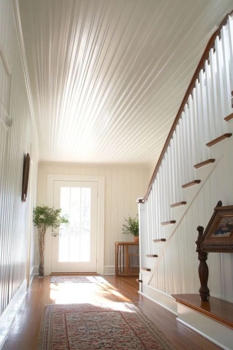 "Add timeless character to your home with a DIY Beadboard Ceiling! 🛠️🪜 Perfect for adding texture and style to any room. 🌟✨ #BeadboardCeiling #DIYProjects #HomeImprovement" Beadboard Wall And Ceiling, Bead Board Ceiling Living Room, Beadboard Walls And Ceiling, Floor To Ceiling Beadboard, Beadboard Wall, Diy Beadboard, Board Ceiling, Beadboard Ceiling, Basement Ceiling