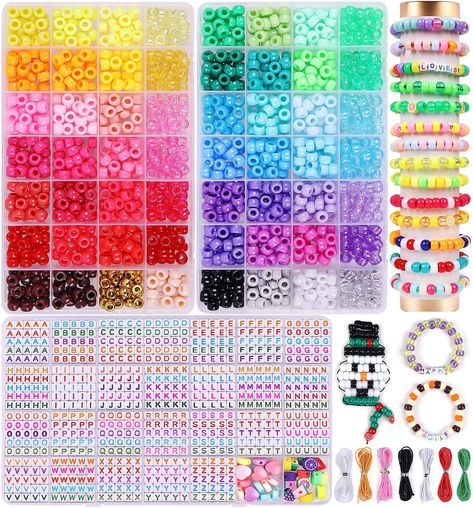 PRICES MAY VARY. 🚀Upgraded Kandi Bracelet Kit: Wuollgess pony beads for bracelets contains upgraded 28 Compartment 2 boxes of kandi beads in 56 unique colors, about 1000pcs A to Z letter beads, 20pcs round colorful heart beads, 20pcs colorful fruit beads, 6 colors nylon strings and 2 crystal strings, 1 scissor and tweezer. ☃️Rich and Special Colors: These pony beads kit have 56 different colors, including a variety of vibrant primary colors, pastel colors, and metallic colors, transparent, pear Kandi Christmas, Rainbow Kandi, Fruit Beads, Friendship Bracelet Kit, Kandi Beads, Beads Kit, Pony Bead Bracelets, Making Friendship Bracelets, Bracelet Making Kit