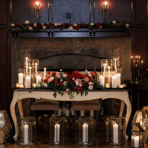 Romantic candlelit sweetheart table with flowers and greenery. Winter wedding sweetheart table. PC Kseniya Berson Photography https://kseniyaberson.com/ Red Sweetheart Table Wedding, Dark Romantic Sweetheart Table, Gothic Sweetheart Table Wedding, Romantic Sweetheart Table Wedding, Moody Sweetheart Table Wedding, Sweet Heart Table Wedding Romantic, Winter Sweetheart Table Wedding, Christmas Wedding Sweetheart Table, Fall Sweetheart Table Wedding