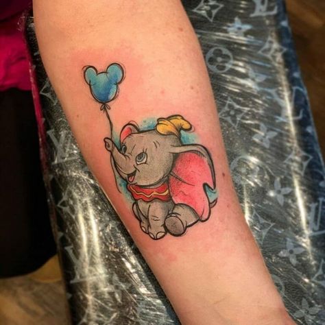 101 Best Dumbo Tattoo Ideas That Will Blow Your Mind! - Outsons Dumbo Tattoo Ideas, Disney Dumbo Tattoo, Tiny Disney Tattoo, Dumbo Tattoo, Disney Tattoos Small, Disney Sleeve Tattoos, Tropical Tattoo, Baby Name Tattoos, Lady Bug Tattoo