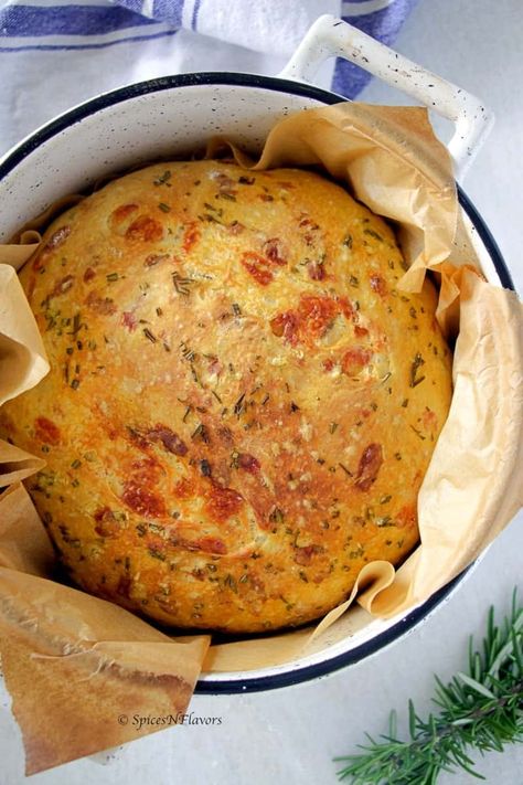 Instant Pot No Knead Bread flavoured with cheese, rosemary and olive oil is the easiest quick bread you will ever make. Just mix all the ingredients, proof and bake and you will have the most rustic, crusty artisan bread in just few hours. Watch the videos as well as the step by step instruction to make this dutch oven no knead bread. #bread #instantpot Dutch Oven Dinner Rolls, Instant Pot Gluten Free Bread, Insta Pot Bread, Insta Pot Bread Recipes, Instant Pot Recipes Bread, Instapot Bread Recipes, Flavoured Bread Recipes, Ninja Foodi Bread, Quick Dutch Oven Bread