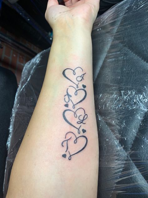 4 Connected Hearts Tattoo, 4 Hearts Tattoo Ideas Family, Mother Daughter Tattoos Meaningful For 3, Vine With Names Tattoo, 5 Children Tattoos For Moms, Mother Of Four Tattoo Ideas, Mom Of Four Tattoo, Heart Tatoos Woman Hand, 4 Heart Tattoo Family