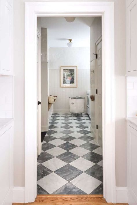 Laundry Room Makeover: Before & After - Stefana Silber Laundry Room Tile Ideas, Checkered Floor Kitchen, Red Oak Wood Floors, Room Tiles Floor, Small Basement Bathroom, Laundry Room Tile, Mudroom Flooring, 90s Home, Laundry Room Wallpaper