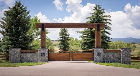 A grand gate introduces the series of arrival sequences to be taken in along the private drive to the main ranch grounds. Farm Gates Entrance, Ranch Entrance Ideas, Entrance Gates Driveway, Acreage Landscaping, Property Gates, Gated Entrance, Driveway Entrance Landscaping, Ranch Fencing, Farm Entrance