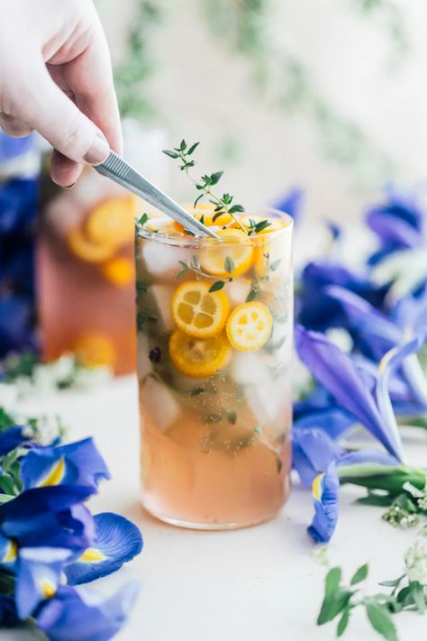 Spring Gin, Kumquat & Kombucha Cocktail in a serving glass. Kumquat Lemonade, Empress 1908 Gin, Kombucha Cocktail, Pitcher Cocktails, Drinks Photography, Cocktail Maker, Gin Cocktail Recipes, Spring Cocktails, Gin Cocktails