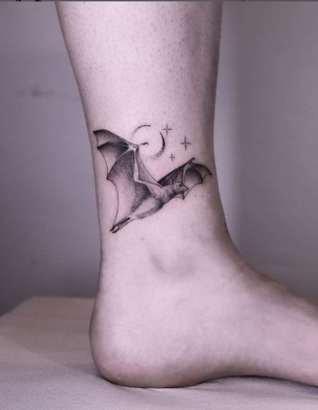 The tattoo depicts a bat with its wings shaded in pale black. It appears fashionable on your physique. Boys are eager to draw black bat wings on their bodies. However, this little bat tattoo is appropriate for both men and... Little Bat Tattoo, Draw Black, Bat Tattoo, Wicked Tattoos, Black Bat, Ankle Tattoo, Bat Wings, Body Art, To Draw