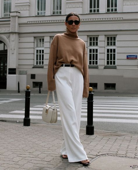 Cosy chic #inthefold.⁠ ⁠ @tamar.tami shows us how it's done, wearing our Clever Crepe ivory trousers with a neutral sweater and black… | Instagram Ivory Trousers, Neutral Sweater, Black Instagram, Neutral Sweaters, The Fold, Black Accessories, Tap, Trousers, Wardrobe