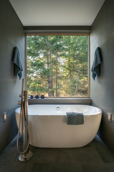 Bathroom Porcelain Tile Walls Design Photos and Ideas - Dwell Bath With Window, Bathroom With View, Bathroom Forest, Bath With A View, Tiles Wall Design, Bathroom With A View, Bathroom View, Porcelain Tile Floor, Porcelain Tile Bathroom