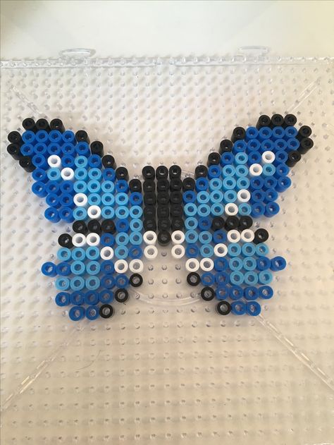 Butterfly Hama Bead Perler Bead Square Board using 2 shades of blue Blue Butterfly Perler Bead, Hama Beads Square, Perler Bead Patterns Square Board, Perler Beads Butterfly, Blue Perler Bead Patterns, Blue Perler Beads, Pyssla Ideas Cute, Butterfly Perler Bead Pattern, Perler Bead Butterfly