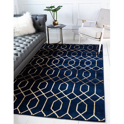 This area rug is the perfect decor piece to emulate the golden age of Hollywood. Rich hues with a metallic gold and silver finish bring the glitz and glamour of the 40s and 50s straight to your space. Rug Size: Rectangle 5' x 8' | Blue / Yellow Area Rug - Mercer41 Corando Geometric Blue / Gold Area Rug Polyester / Polypropylene in Blue / Yellow | Wayfair Blue And Gold Living Room, Blue And Gold Bedroom, Navy Bedrooms, Blue Living Room Decor, Gold Area Rug, Gold Living Room, Black Living Room, Glitz And Glamour, Gold Bedroom