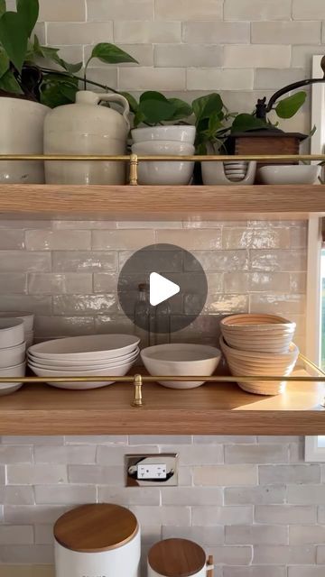 Ashley | Home Decor • DIY on Instagram: "✨Comment “LINK” for the links to this unlacquered brass shelf rail, my white oak floating shelves, and more seen here. 

✨Direct 🔗: https://liketk.it/4ORFd

#etsy #etsyfinds #unlacqueredbrass #kitchenshelves #openshelving #whiteoak #zellige #kitchendecor #kitchendesign 

Brass shelf rail, gallery rail, tipping rail, natural white zellige, white oak shelves, unlacquered brass" Shelves With Brass Rails, Kitchen Shelf With Brass Rail, Floating Shelves Brass Rail, Floating Shelf With Brass Rail, Wood Shelves With Brass Rail, Kitchen Floating Shelves, Brass Shelves, Ashley Home, Oak Floating Shelves