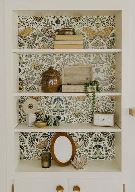 30+ Wallpaper Ideas to Spice Up Your Bookshelves - Days Inspired Book Shelf With Wallpaper, Wallpaper For Bookshelves, Wallpapered Shelves Built Ins, Built In Shelves Wallpaper, Wallpaper In Bookshelves Built Ins, Wallpapered Bookcase, Wallpaper Built In Shelves, Hallway Nook Ideas, Beige Shelves