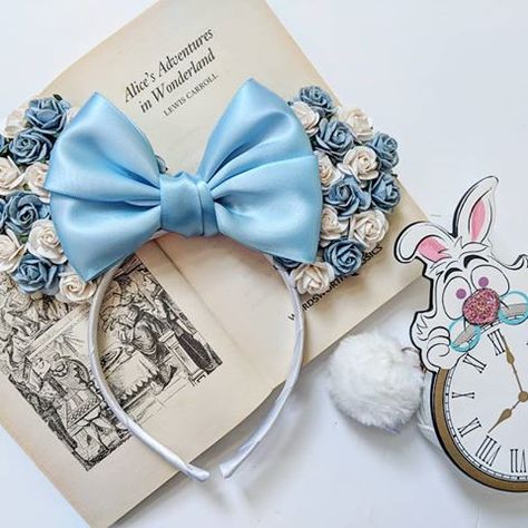 We're in love with these colours 💙 #aliceinwonderland #wonderland #whiterabbit #floral #flowers #minnieears #minniemouseears #disnerd #disneyside #disneybound #disneygram #instadisney #disneyigers Alice In Wonderland Mickey Ears, Inside Out Mickey Ears, Tim Burton Disney, Floral Mickey Ears, Flower Disney Ears, Encanto Mickey Ears, Pokemon Jewelry, Cute Mickey Mouse, Disney Trip Outfits