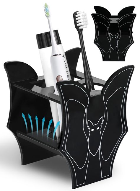 PRICES MAY VARY. SPOOKY GOTHIC BATHROOM DECOR: The goth decor bathroom toothbrush holder has a stylish bat design with simple and smooth lines. It is the epitome of Gothic aesthetics and will inject a weird Gothic and spooky atmosphere into your room DECORATIVE FORM MEETS FUNCTION: The Halloween vampire home decor tooth brushing holder retains the weird Gothic appearance while setting two 1.4'' diameter round holes and a 1.2'' * 3.1'' square hole. You can store toiletries according to your needs Silly Home Decor, Emo House Decor, Romantic Goth Decor, Modern Gothic Furniture, Goth Apartment Decor, Apartment Halloween Decorations, Gothic Baby Nursery, Halloween Apartment Decor, Pastel Goth Home Decor