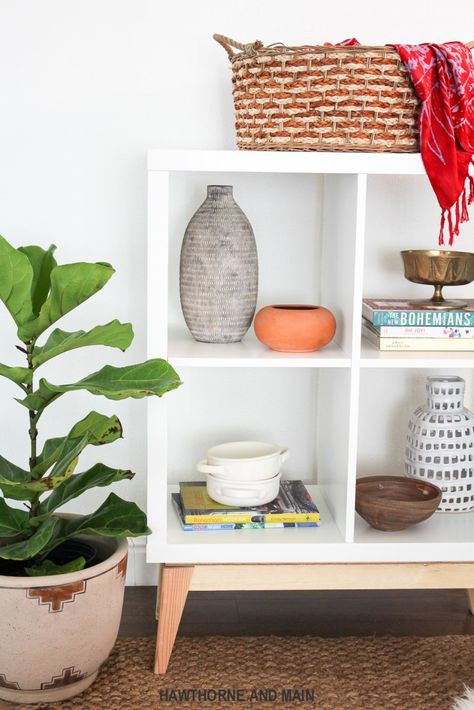 I love this IKEA hack! It has a really fun mid-century modern feel. The whole base is DIYed! awesome! Ikea Hack Living Room, Ikea Kallax Shelving, Ikea Kallax Shelf, Ikea Kallax Hack, White Storage Cabinets, Kallax Shelf, Ikea Kallax, Decor Ikea, Best Ikea