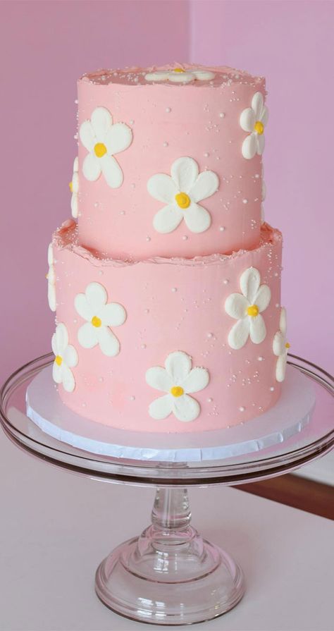 daisy pink cake, first birthday cake, summer-themed cake, summer theme cake, birthday cake, summer vibe cake, colorful cake, colourful cake ideas, tropical vibe cake, cherry cake Two Tier Groovy Cake, Flower Cake First Birthday, Groovy Smash Cake Ideas, Colourful Cake Ideas, Cake Summer Theme, Daisy Cake Ideas Simple, Birthday Cake For 2 Year Girl, Summer Theme Cake, Buttercream Daisies