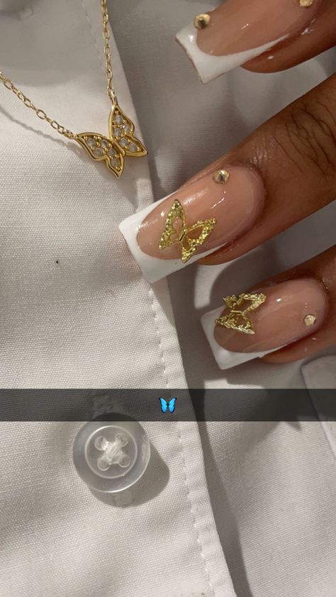 Gold Butterfly Acrylic Nails, Butterfly Nails Gold, White French Tip With Gold Charms, White And Gold Butterfly Nails, Nails With Gold Butterflies, Nails With Butterfly Charms, Nail Inspo Butterfly, Butterfly Nails White, Gold Butterfly Nails