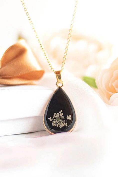 Natural, dried Queen Anne's lace in a teardrop gold pendant filled with black resin. Pressed Flower Necklace, Queen Anne's Lace, Queen Annes Lace, Black Resin, Elegant Necklace, Black Pendant, Elegant Necklaces, Pressed Flower, How To Preserve Flowers