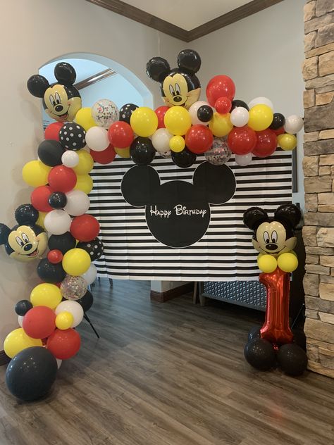 Red, white, yellow and black balloon arch with Mickey Mouse balloons Mickey Mouse Balloon Decor, Birthday Decorations Balloons, Mickey Mouse Balloon, Mickey Mouse Birthday Decorations, Mickey Mouse Balloons, Mickey Mouse 1st Birthday, Minnie Birthday Party, Decorations Balloons, Birthday Wall