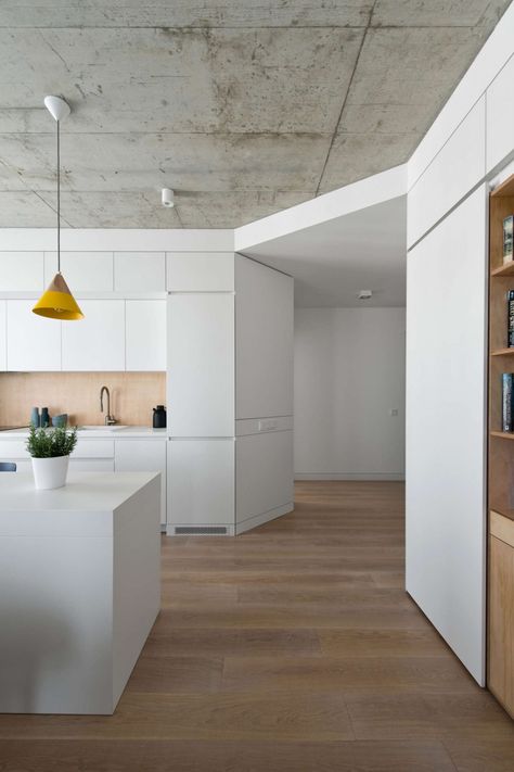 Apartment in Vilnius by Normundas Vilkas Concrete Ceiling Design, Decorative Ceiling Panels, Concrete Interiors, Concrete Ceiling, Concrete House, 아파트 인테리어, Urban Spaces, Ceiling Decor, Wood Flooring