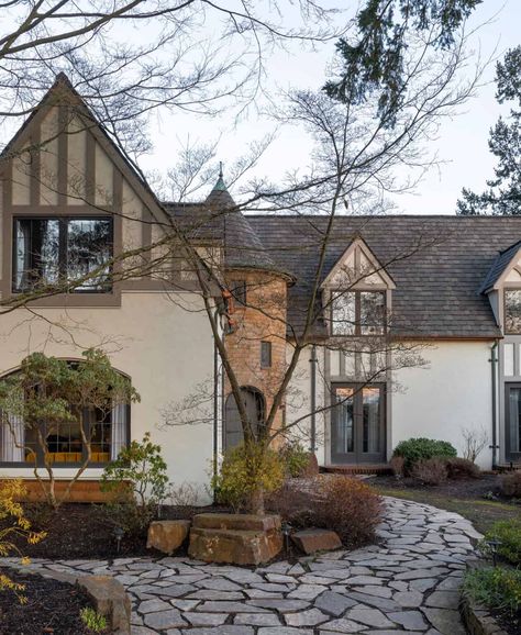 A storybook Tudor home in Washington gets a stunning modern update Tudor Style Homes Exterior, Tudor House Exterior, Seattle Interior Design, Beautiful French Doors, Tudor Home, Tudor Cottage, Mid Century Furnishings, Storybook Homes, Homes Exterior